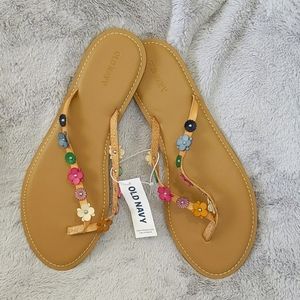 Sandals with flower accent